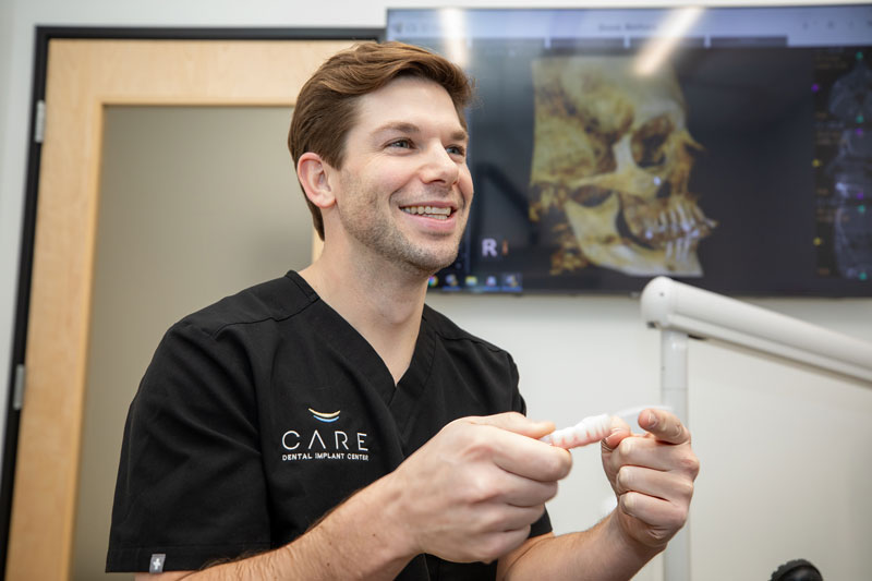 Headshot of Dr. Phillips With Model